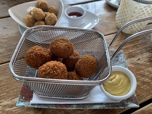 Vegan croquettes and green curry Thai bites at De Zeemeeuw in Noordwijk