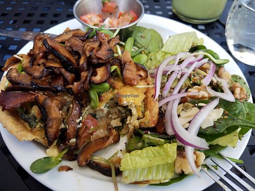 I added smoky mushrooms on top of the quiche...best ever plus a yummy side salad comes with it and a helping of pico! at Fox & Fig in Savannah