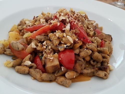 pasta with black chick peas, eggplant, two types of tomatoes, roasted nuts, mushrooms, potatoes (all being vegetables from Puglia, the area where the chef originates from!). at Sud - Food of Italy in Bruges