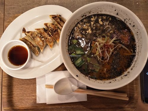 Black sesame ramen with gyoza. at T's Tantan - Ecute Ueno in Tokyo