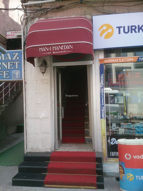 The entrance is easy to miss. Look at the floor above - you will see the writings. at Han-I Hanedan Cafe in Kars