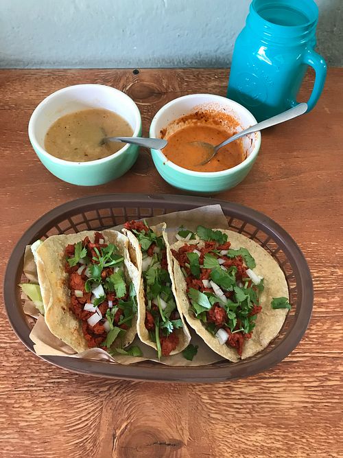 Delicious taco combo.  Soy tacos al pastor.  Housemade salsas and agua del dia.  Very good! at Veggie Happy in Queretaro