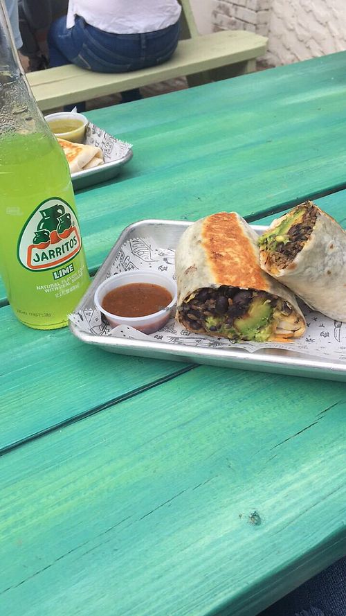 Mission style burrito with grilled avo and vegan chipotle aoli at Tacoria in New Brunswick