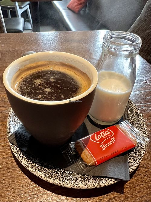 Americano with oat milk on the side  at Roos Leap in Montrose