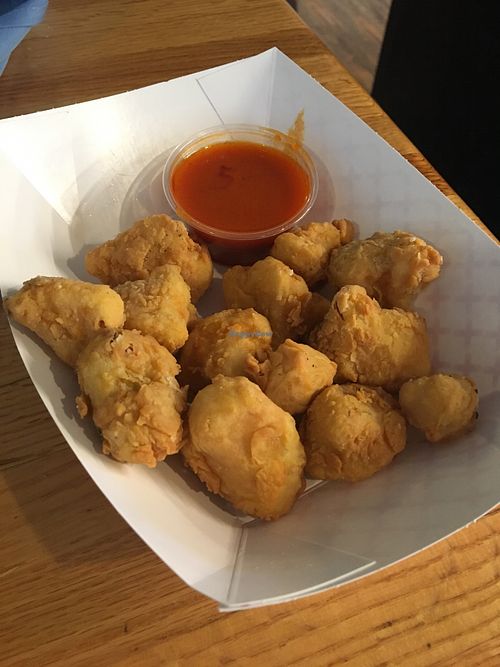 Regular size popcorn cauliflower with buffalo sauce at Water & Wheat in Coloma