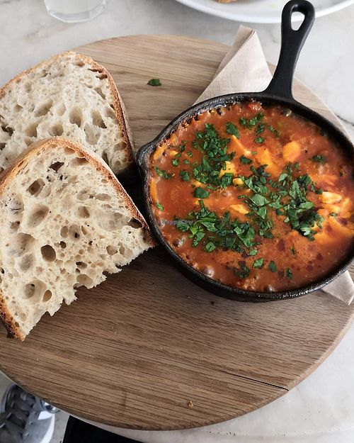 Lovely vegan dish with tofu and sourdough at East Village Cafe in Bristol