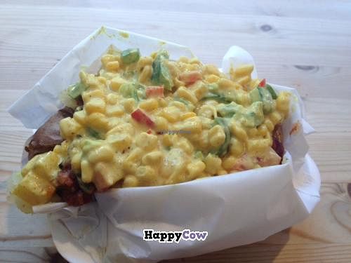 Baked potato with vegan chili and curry corn at The Baked Potato Shop in Edinburgh