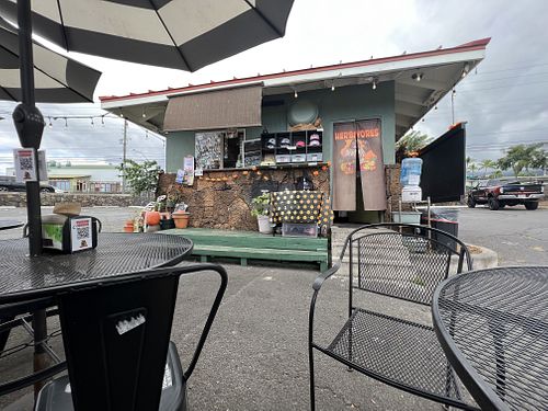 In the middle of a parking lot, doesn’t matter still yummy!!  at Herbivores in Kailua Kona