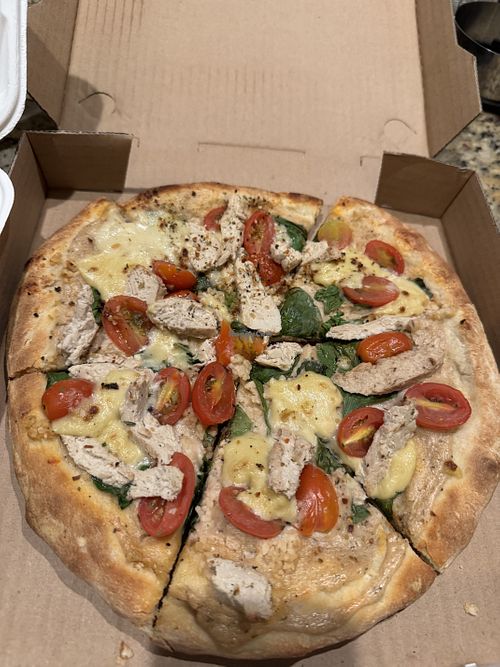 Chicken Alfredo pizza  at Herbivores in Kailua Kona