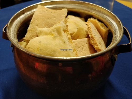 bread with poppy seeds and water of rose  at Cardamom Persian Palace in Como