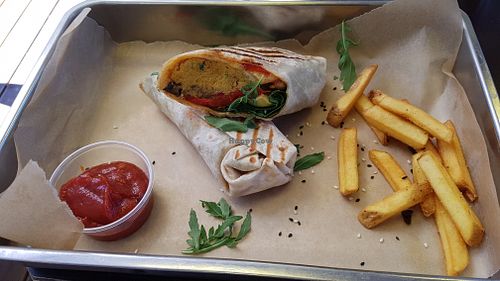 Tortilla with grilled vegetables, hummus and guacamole at Bukowski Bar in Klaipeda