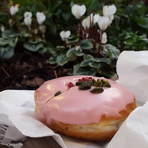 Vegan pomegranate and orange blossom doughnut at Crosstown Doughnuts - Victoria in London