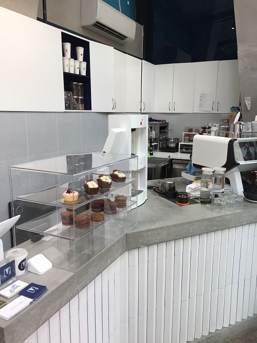Counter with cakes and biscuits at V. Melb in South Yarra