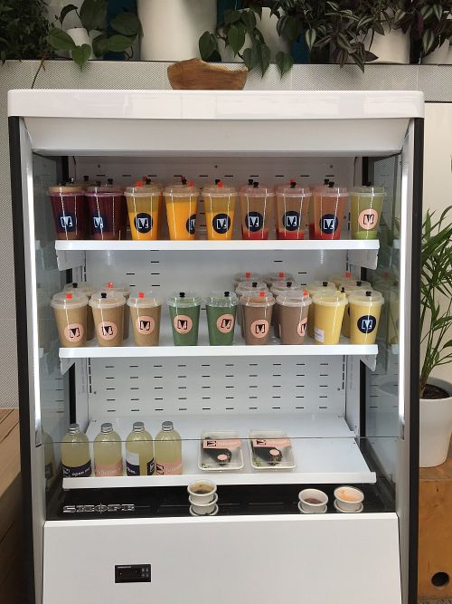 Fridge with juice and sushi at V. Melb in South Yarra