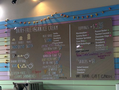 Menu board at Juice Girl & Over the Moon - 19th St in Houston