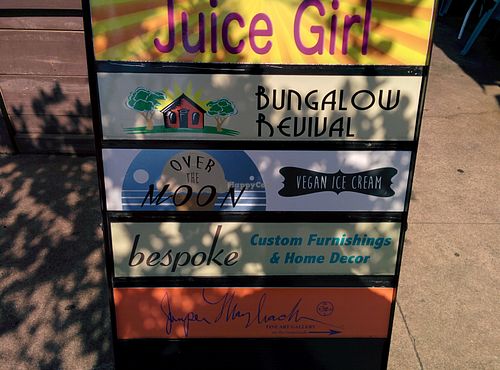 View from the street at Juice Girl & Over the Moon - 19th St in Houston