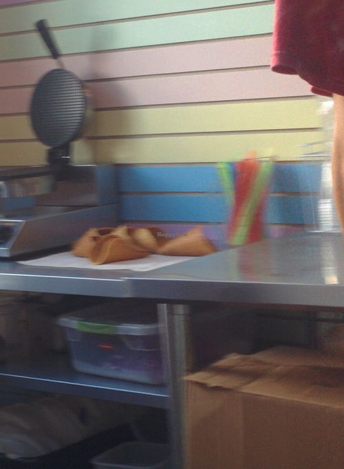 Waffle cone making station; gluten free options are available at Juice Girl & Over the Moon - 19th St in Houston