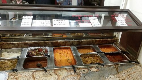 We visited this Indian Restaurant in Mesa, AZ on Dec 1, 2017 for the first time, It’s a nice place, with a dinner buffet. There are clearly marked portions of the buffet for Vegan options.
The food all tasted great, they had many Vegan options, but also some meat. They bring fresh made breads to the table as you eat. There was chai tea & mango juice as well as some sweets. Friendly staff. They were open late 10pm

More Pics 
http://whatdoyoueatthen.com/india-oven-mesa-az/ at India Oven in Mesa