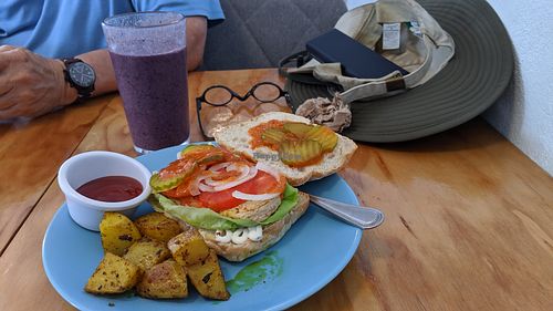 Buffalo Chicken Sandwich and smoothie. at Cali Cafe in Cozumel