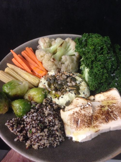 Eat your veggies
Sautéed kale, Brussels sprouts, quinoa, tofu, grilled coliflower, soy bean hummus at enkel in Barcelona