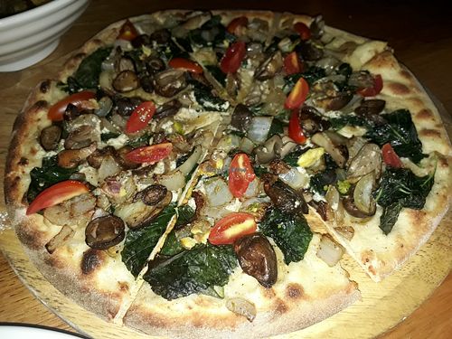 Spinach and mushroom pizza at Green-Go Garden in Siem Reap