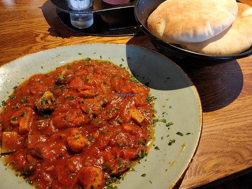 Shakshuka with pita breads at Napo's Quality Grill in Antwerpen