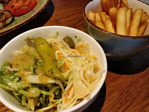 Salad and fries at Napo's Quality Grill in Antwerpen