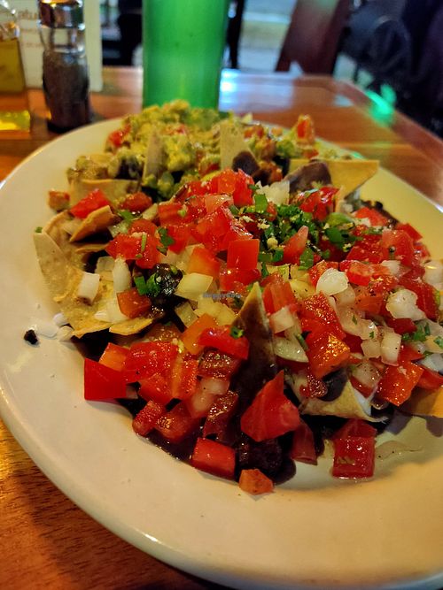 Nachos con guacamole y Pico de gallo at Bio & Natural - Quinta Avenida in Playa Del Carmen