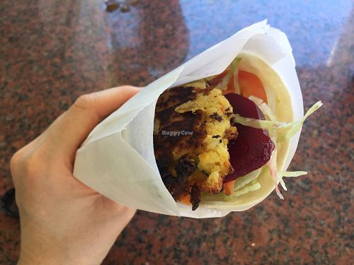 Vegan wrap with a pattie inside at The Yarck General Store in Yarck