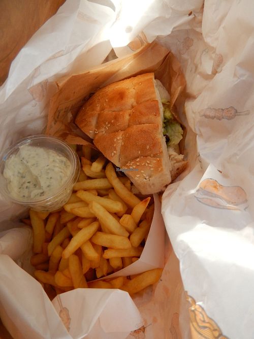guacamole burger and fries with sauce at De Frietketel in Ghent