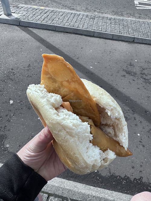 Roll and samosa   at Real Foods in Edinburgh