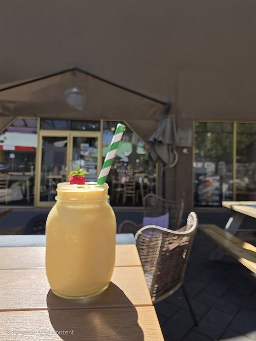 Mango smoothie with coconut yoghurt and oat milk at Cafe Chickpea in Horsham