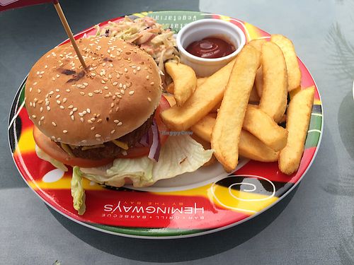 Beyond Burger with vegan coleslaw and fat chips at Hemingway's By The Bay in Outlying Islands