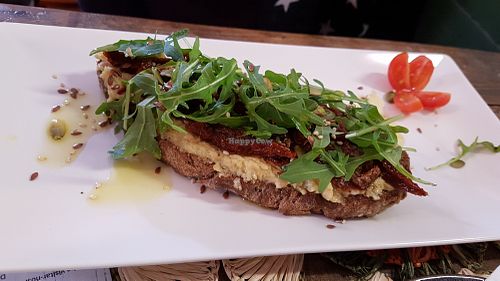 Hummus toast at Dona Flor Cafe in Lisbon