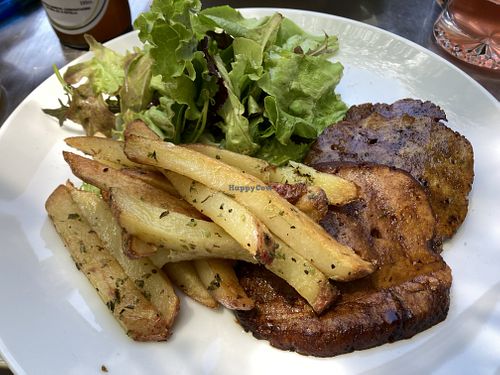 Seitan with fries and salad  at Basilic Bistrot in Coyhaique