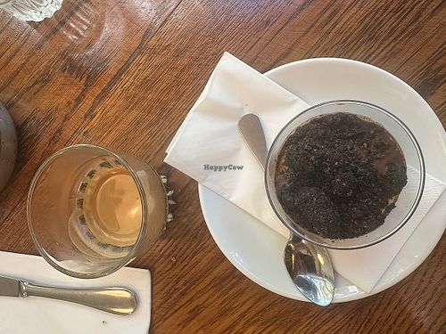 Tiramisu and a coffee. at Meshek Barzilay Deli in Tel Aviv