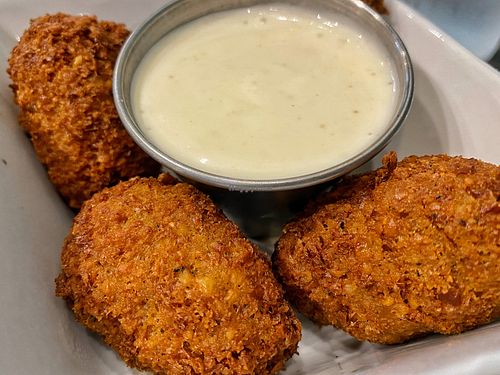 Chickpea fritters   at Planted in Hamilton in Hamilton