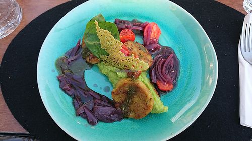 mashed potatoes & peas with onion gravy at V-mOnd in Thun