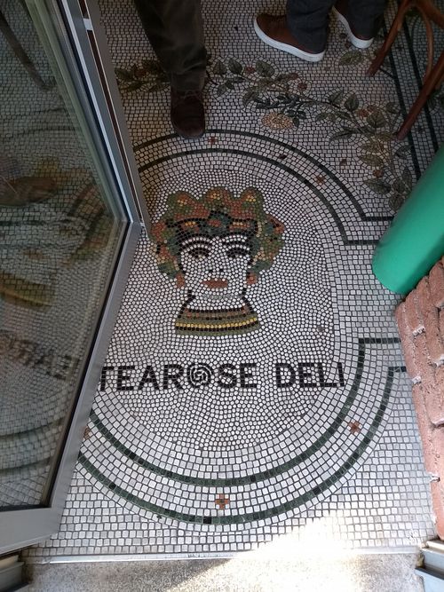 The trademark mosaic floor of Tearose Deli at Tearose Deli in Monza