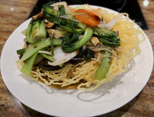 Deep fried noodles with mushrooms and tofu at Hue Delights in Ho Chi Minh City