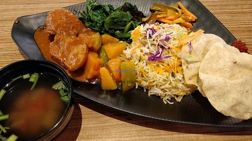 Dhum Briyani with curry potatoes, pumpkin, green vegetables. a free bowl of soup at AMK Hub - Vegetarian Stall in Northeast Singapore