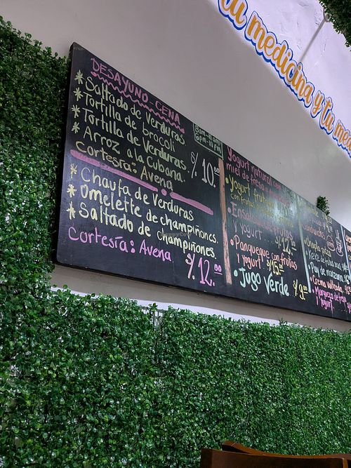 Menu board on wall June 2025 at Vida Saludable in Ayacucho