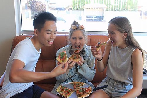 Green Vegan Pesto- tomatoes, mushrooms and olives, atop a pesto base.  at Feed Me Pizza in Collinswood