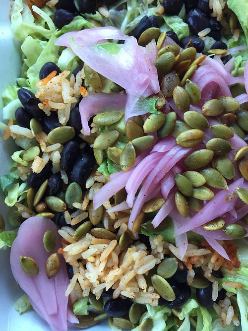 Salad with pickled onions, pumpkin seeds, beans, rice, and lettuce! at Cilantro Restaurant in Manchester Center