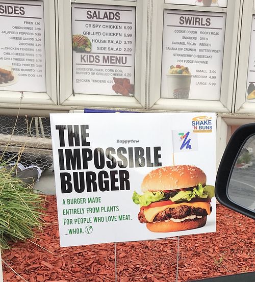 Impossible burger advertised in Shake N Buns drive thru at Shake 'N Buns in Bakersfield