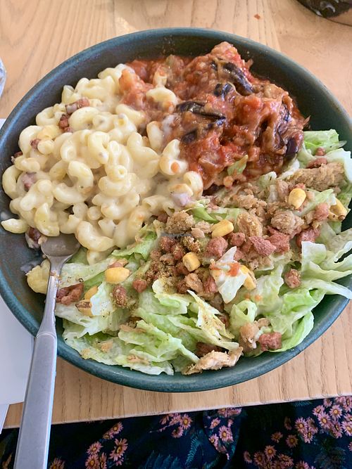 Mac & cheese, parmigiana & caesar salad (all gf)  at Purezza Camden in London