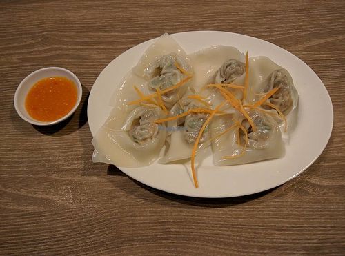 Dumplings with some sort of spicy dipping sauce at Genesis 创世界素食馆 in Central Singapore