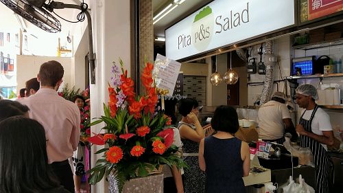 lunch time crowd in front of stall at Pita&Salad in Central Singapore