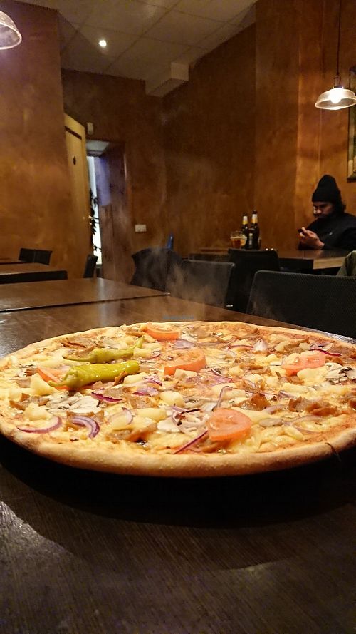 Kebabpizza with extra pineapple and mashrooms. Size is bigger, and the pizza looks more colourful in real, the photo don't make it justice. at Tellus Pizza in Hagersten