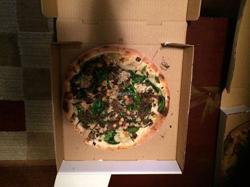 This was a create your own small pizza: olive oil base, chickpeas, mushrooms, and spinach.  The cheese was the cashew based vegan mozzarella.    at Olio in St Johns